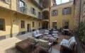 The Yard a Biella: finestre in legno e spazi per vivere insieme