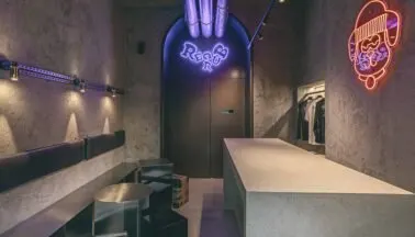 Regrub Milano: acciaio e luce calda per un diner industriale